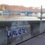 a sign that is on the side of a wall