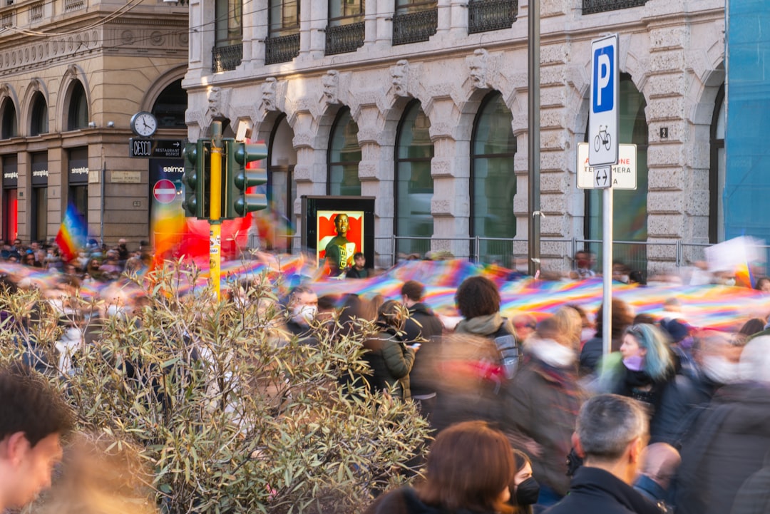 a large group of people standing in front of a building