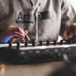 a person playing a game of chess on a table