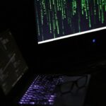 A laptop computer sitting on top of a desk