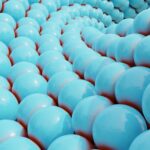 Rows of light blue spheres form a spiral pattern.