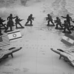 Toy soldiers and jets arranged on a map