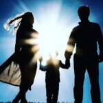 man and woman holding hands