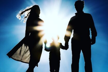 man and woman holding hands