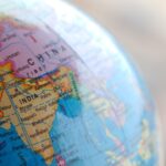 blue and brown world map globe