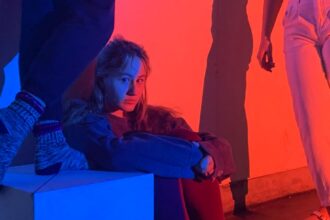 woman in blue jacket and blue denim jeans