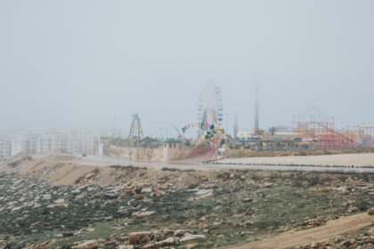 a foggy day at an amusement park