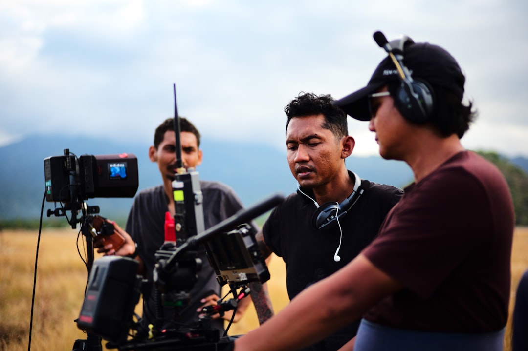 a group of men with cameras