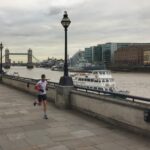 a person running on a bridge