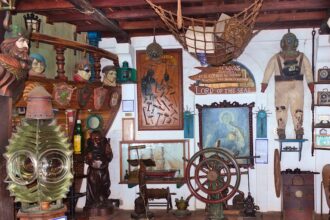 a room is filled with antique items