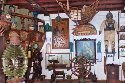 a room is filled with antique items