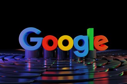 the google logo is displayed in front of a black background
