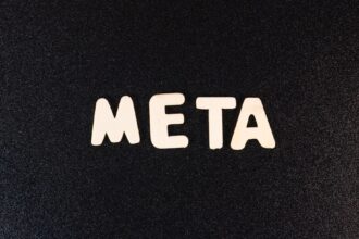 a close up of a black surface with white letters