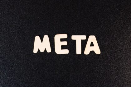 a close up of a black surface with white letters