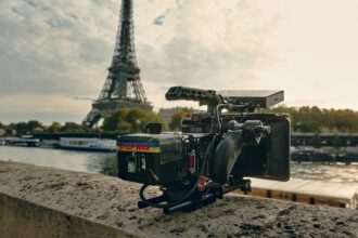 a camera set up in front of the eiffel tower