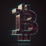 A shiny bitcoin logo on a black background