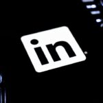 Linkedin logo on a dark keyboard
