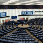 Modern parliamentary chamber with tiered seating