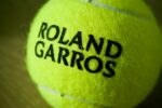Close-up of a roland garros tennis ball.