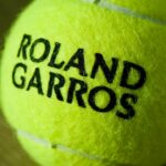 Close-up of a roland garros tennis ball.