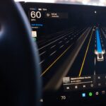 Car dashboard displaying autonomous driving interface
