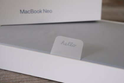 Macbook neo box with a hello sticker
