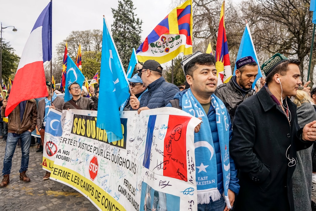 man wearing blue scarf