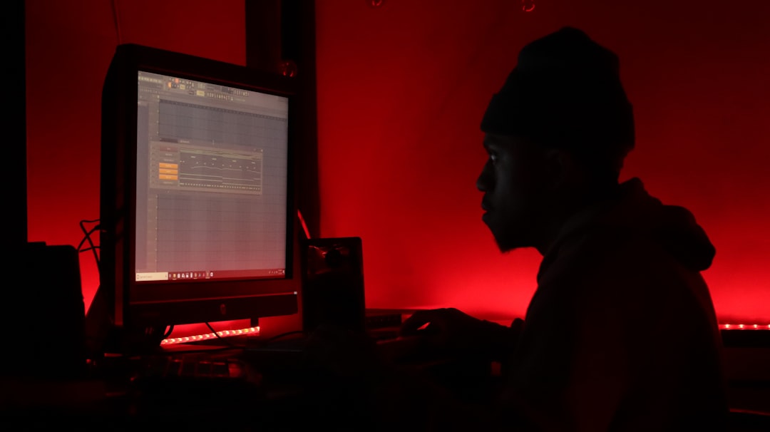 man in front of monitor
