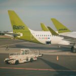 white passenger plane on airport during daytime