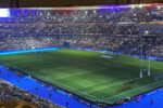 a large stadium filled with lots of people