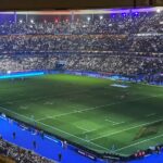 a large stadium filled with lots of people