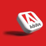 the adobe logo on a red background