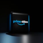 a black rectangular object with a blue logo on it