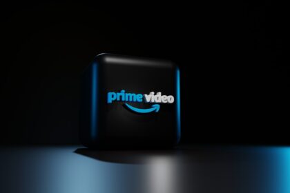 a black rectangular object with a blue logo on it