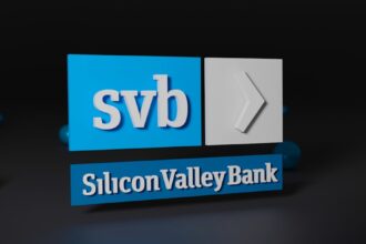 a blue and white sign sitting on top of a table
