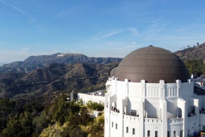 a large white building with a dome on top of it