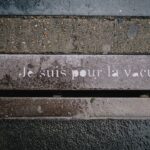 A bench that has writing on it