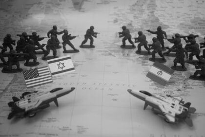 Toy soldiers and jets arranged on a map