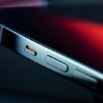silver iphone 6 on red surface