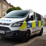 white and blue police car