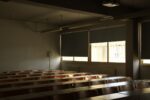 An empty classroom with no students in it