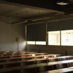 An empty classroom with no students in it