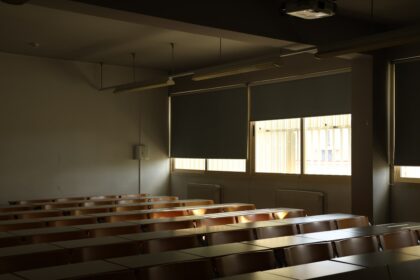 An empty classroom with no students in it