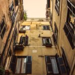 low-angle photography of yellow high-rise buildings