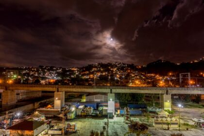 city with high rise buildings during night time