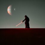 a man that is standing in the dark