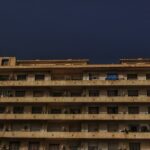 a tall building with balconies and balconies on the balconies