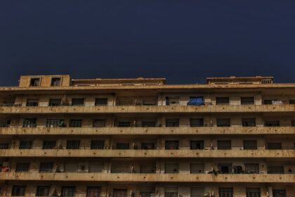 a tall building with balconies and balconies on the balconies