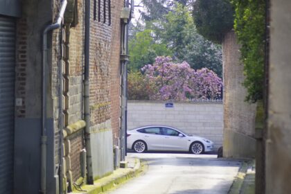 a car is parked on the side of the road