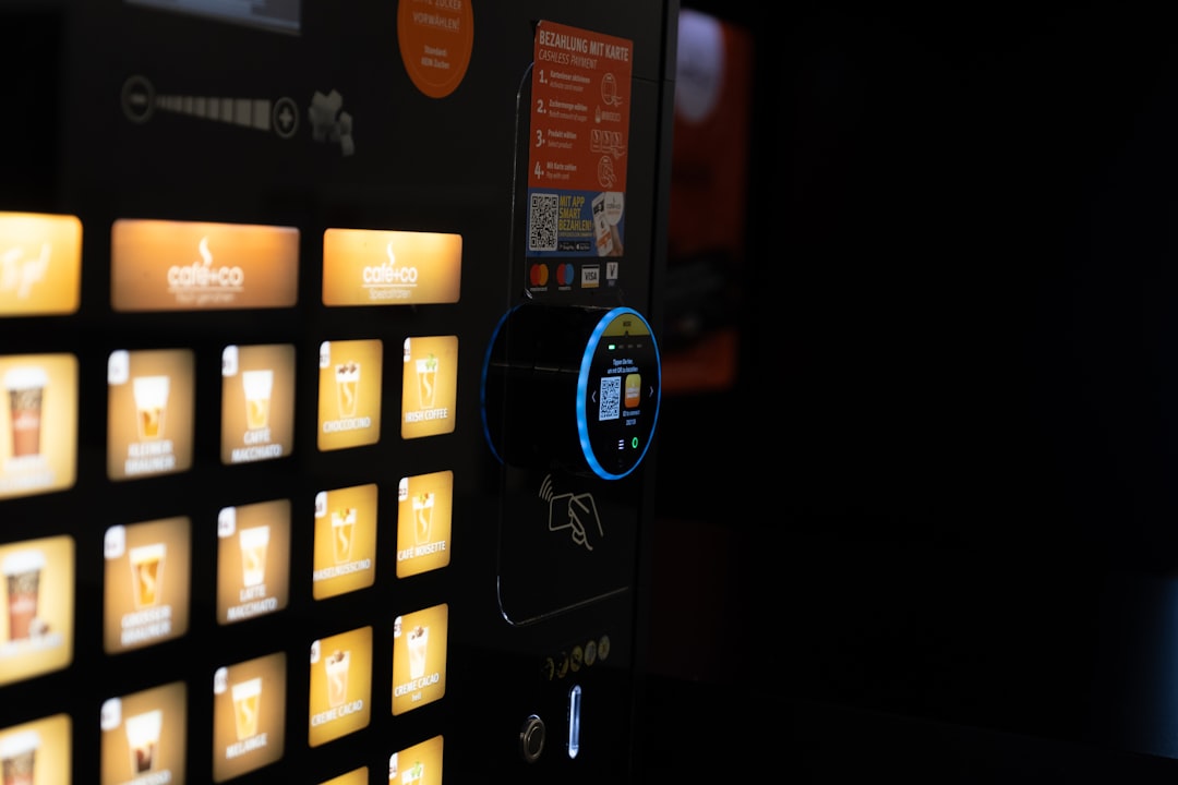 A vending machine is lit up at night